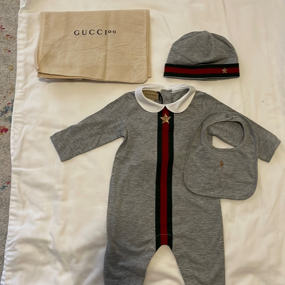 3-piece Gucci baby ensemble, includes hat, bib & bag. New w/ tags. 3-6 months.